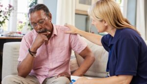 Palliative team member discusses options with client
